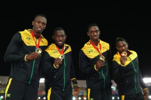 Usain Bolt, Jason Livermore, Kemar Baily-Cole, and Nickel Ashmeade with gold medal. 