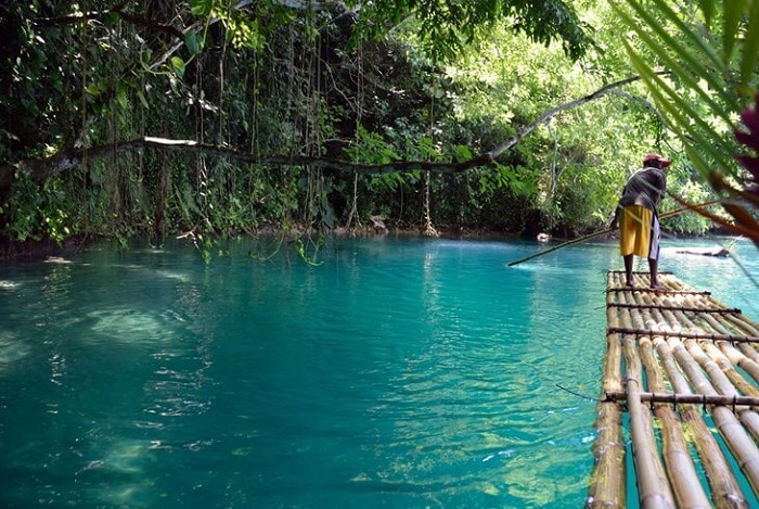 local showing tourists around the blue lagoon