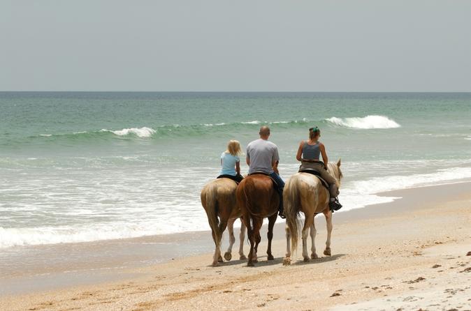 tourists on a horseback riding tour in Negril