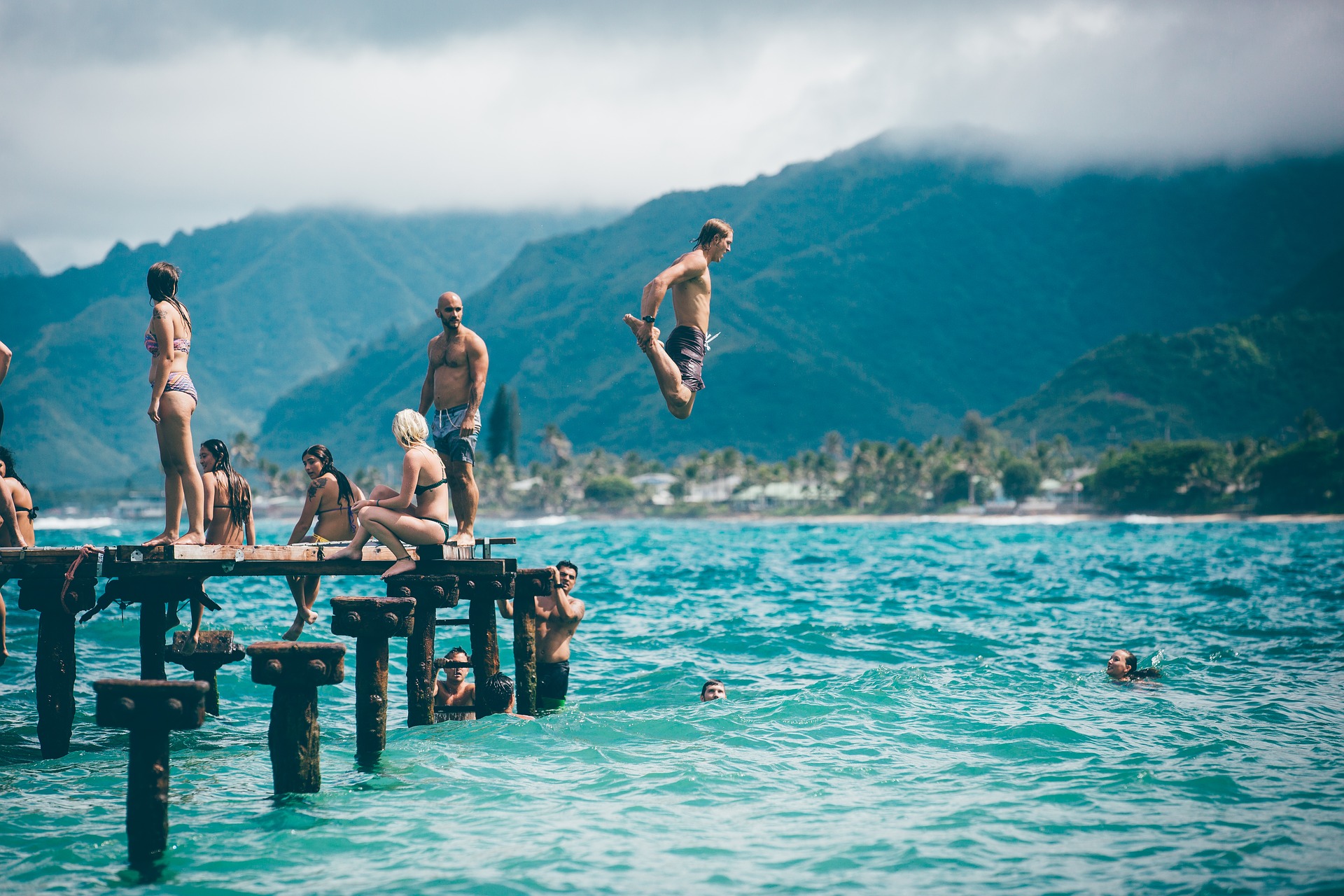 People Swimming on the Beach